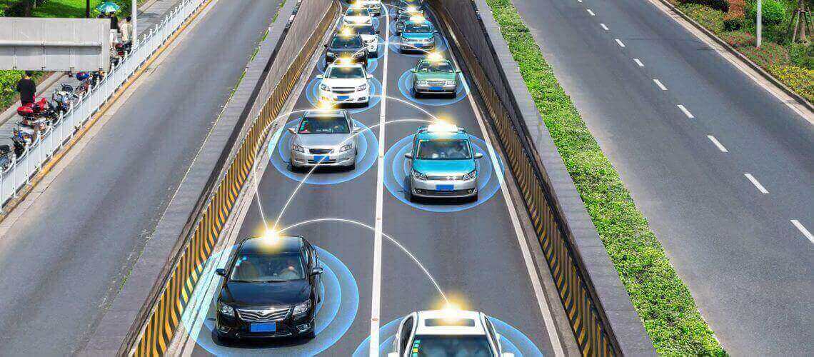 Vehicles on the highway using telematics to communicate important information in real-time.